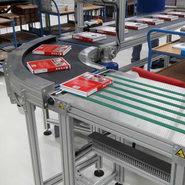 Transport of books with round bend Type KDC