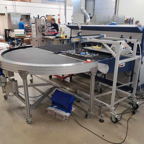 Transport of clothes with curved belt Type KDZ