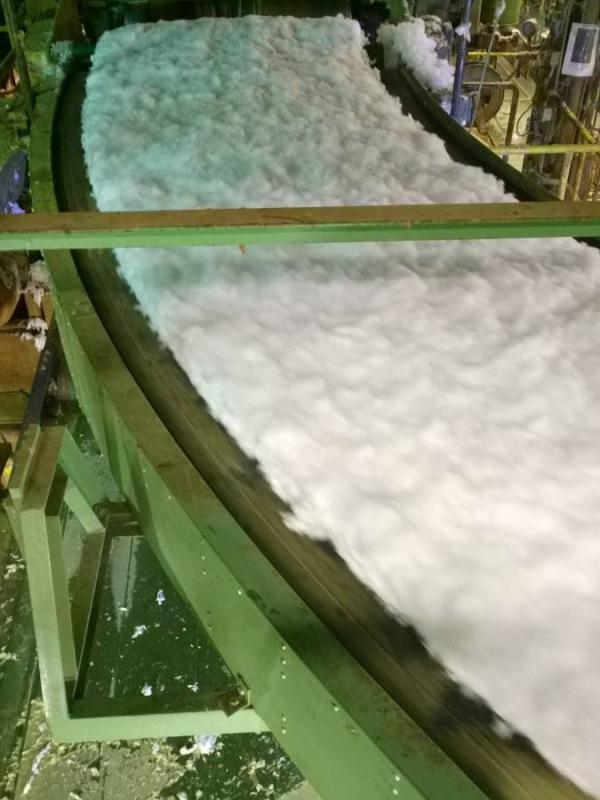 Transport of insulation wool with round conveyor Type R