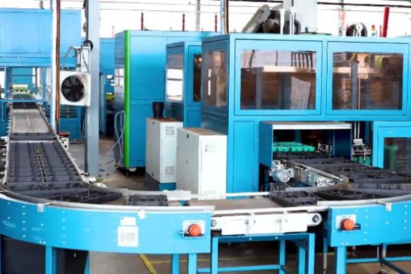 Transport of trays through a round conveyor Type R